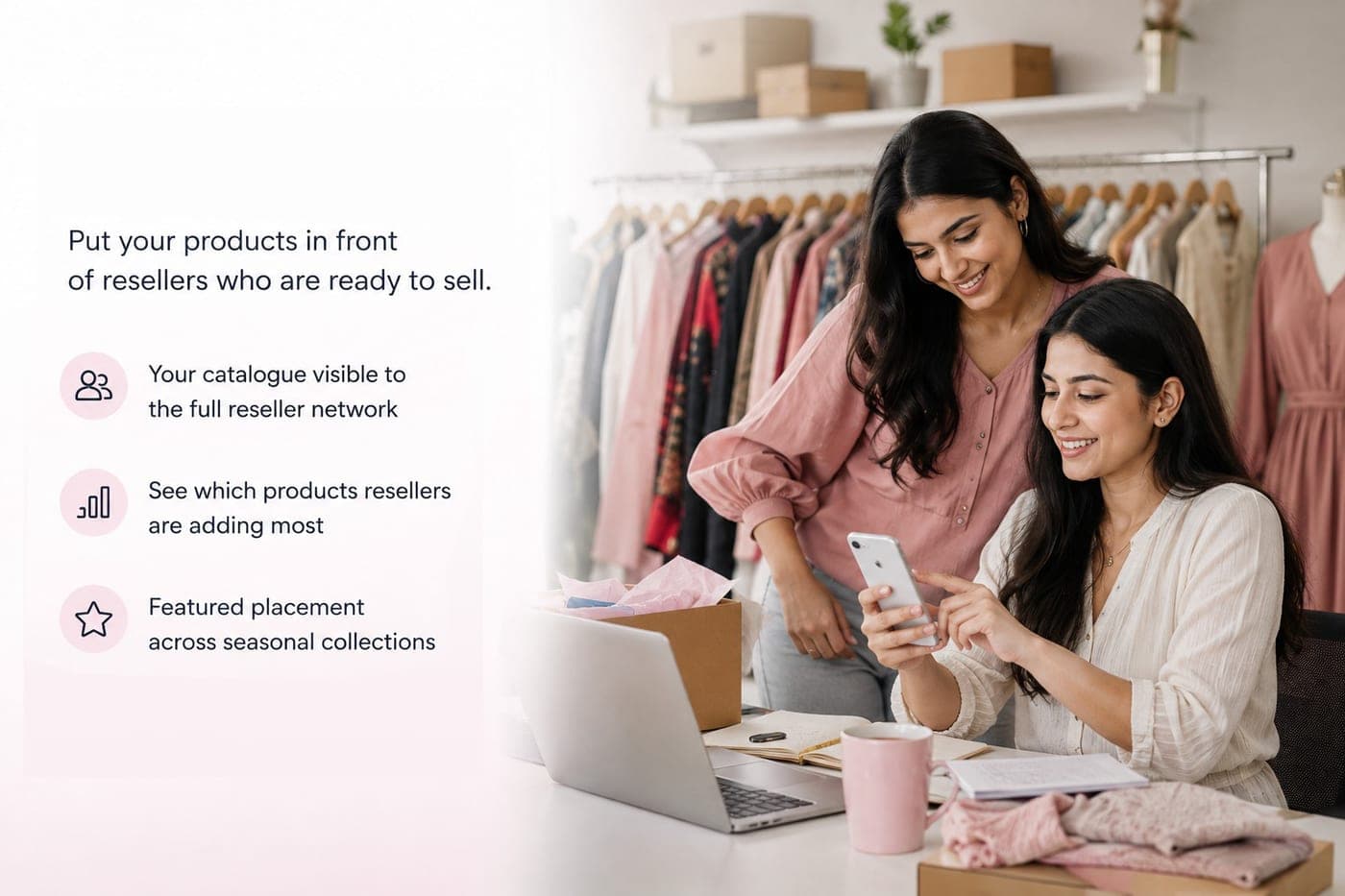 Two women reviewing which of their products resellers are adding most